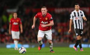 Rooney in azione con la maglia dello United ( Getty Images )