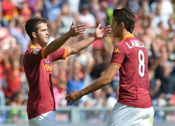 I giocatori della Roma esultano dopo un gol (Getty Images)