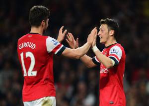 I giocatori dell'Arsenal esultano dopo aver segnato (Getty Images) 